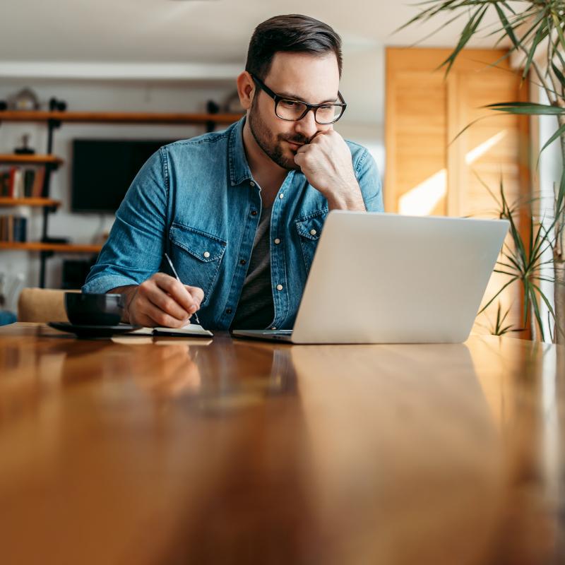 Man using laptop.