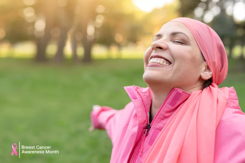 Lady enjoying the great outdoors, wearing her pink for Breast Cancer Awareness Month