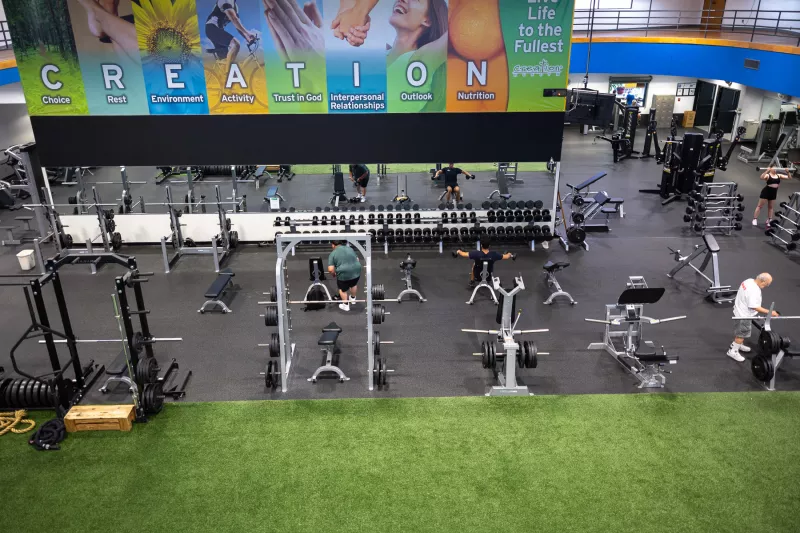 Picture of the gym equipment and indoor turf at the THH Fitness Center